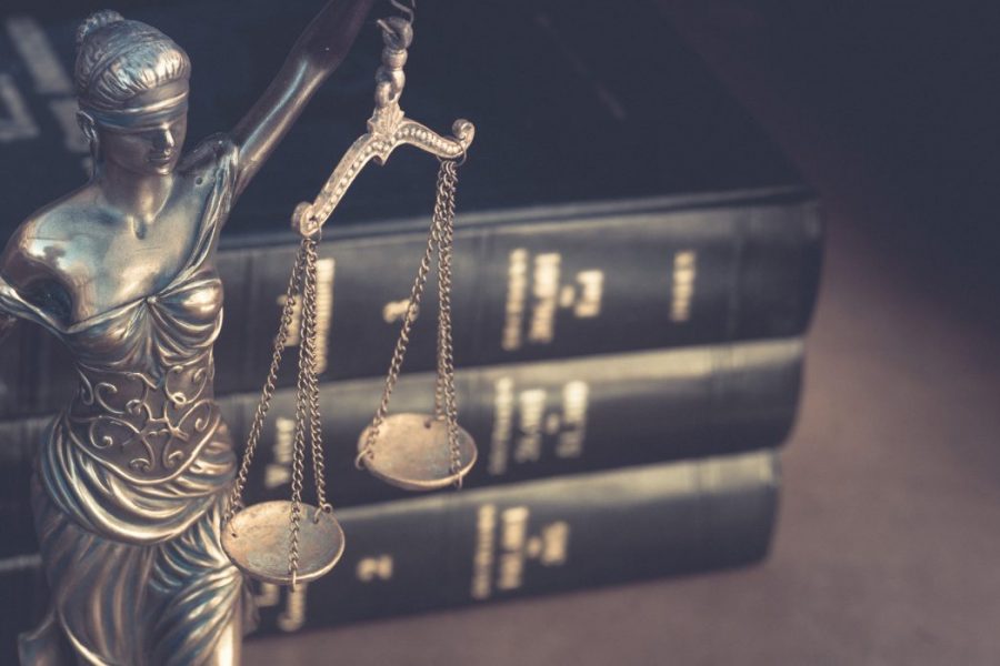 Legal books and statue