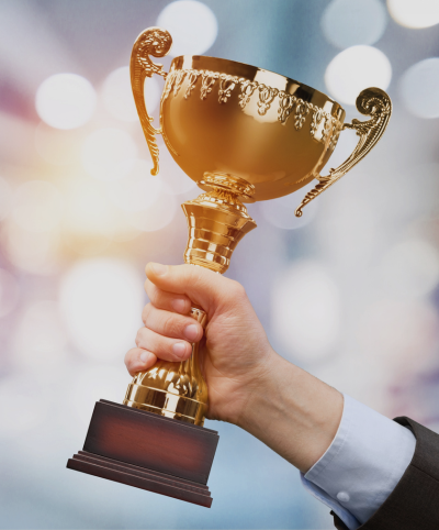 Holding up an award trophy | Chamber USA 2026 Rankings