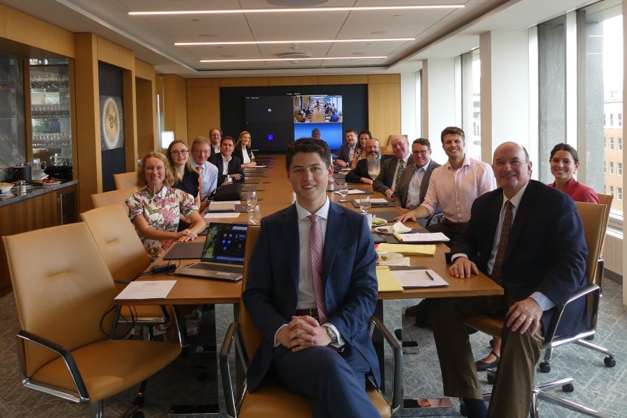 NAAOP Fellow Elijah Brummond, center, with health care and O&P stakeholders gathered for a luncheon on Medicare amputee transitions in care hosted in Powers Pyles Sutter & Verville's main conference room.