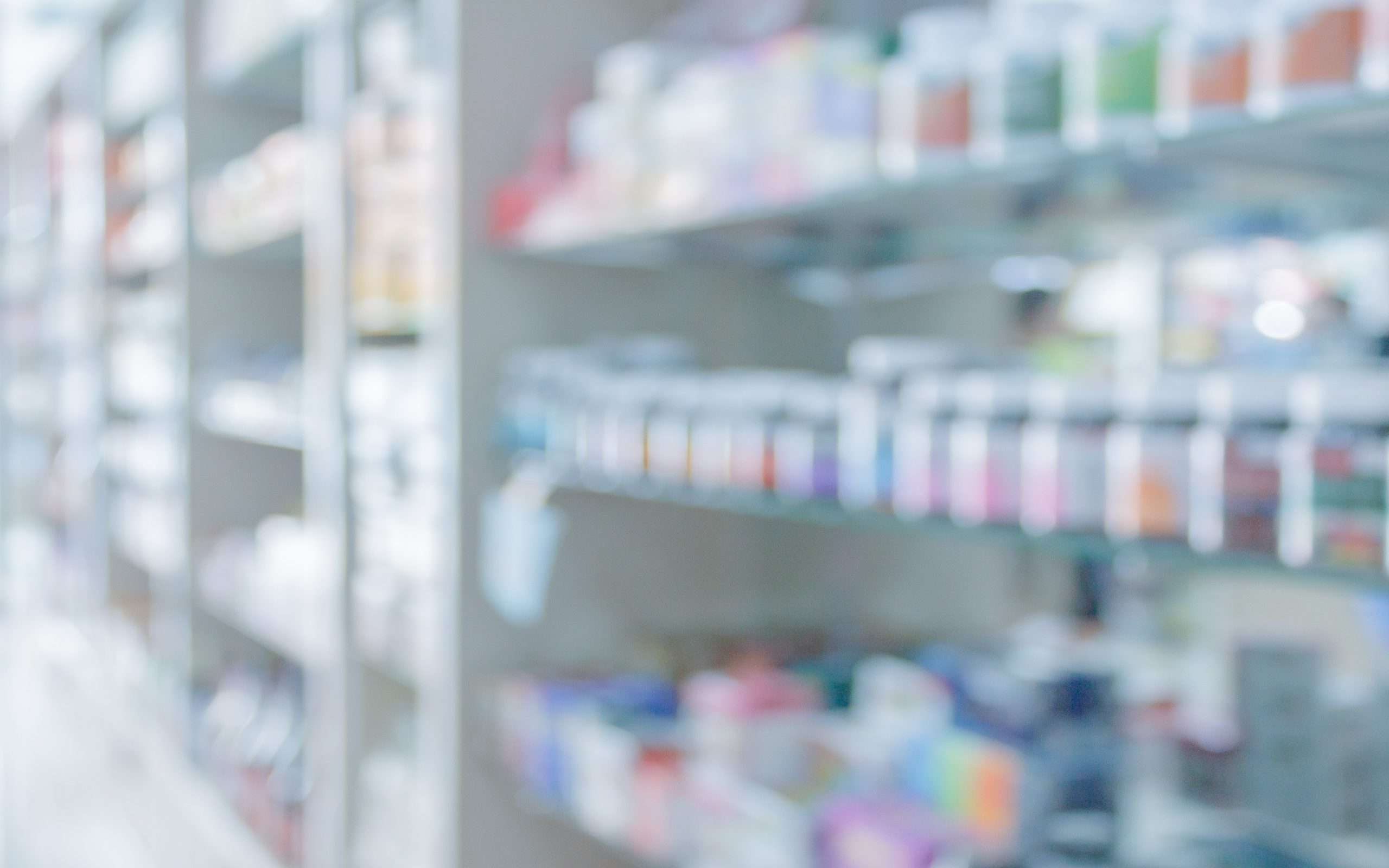 Pharmacy drugstore shelves interior blurred abstract background stock photo