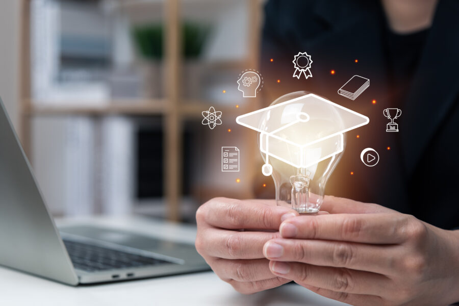 E-learning graduate certificate program concept, businessman hand holding light bulb with Internet education course degree, study knowledge, creative thinking idea, problem solving solution, AI.